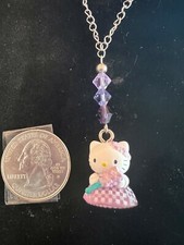 Hello Kitty charm necklace jewelry Purple dress Flowers. Sanrio
