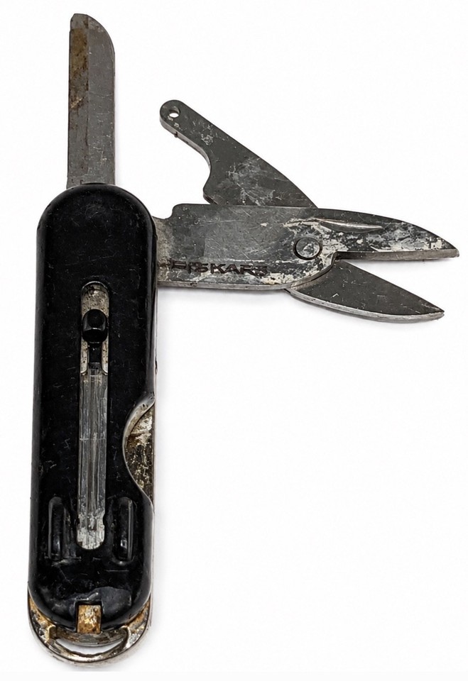 Fiskars folding pocket scissors from Finland — a sleek, minimalist design relic from when Fiskars made things built to last a lifetime.