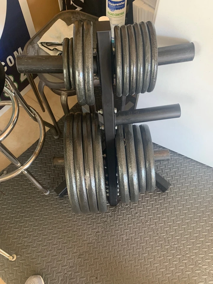 juego banco de pesas con pesas usado Foto 2 de 4