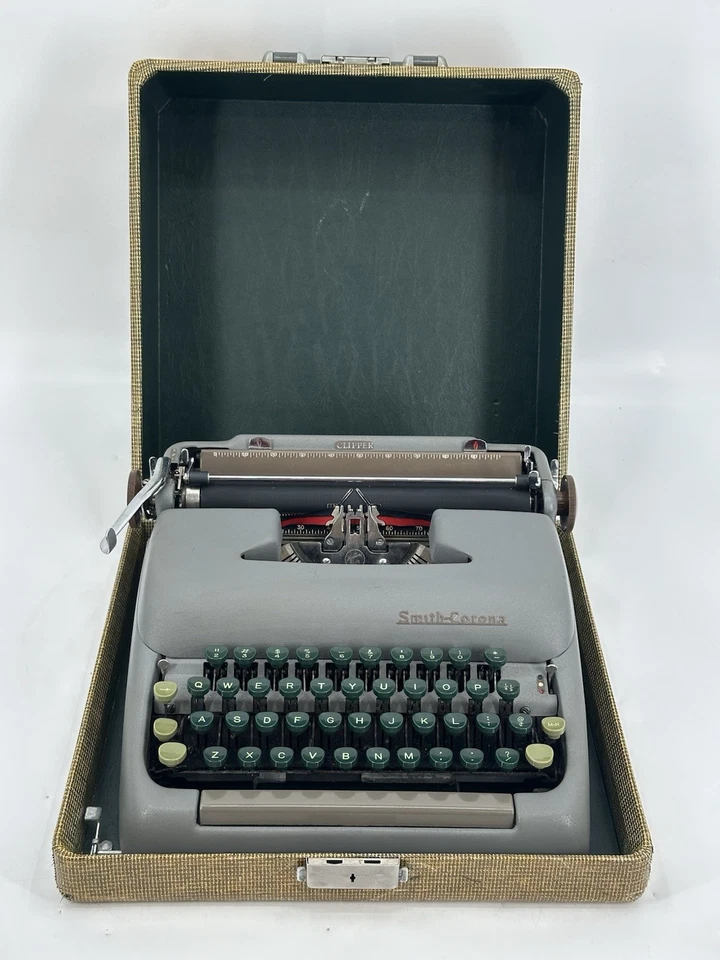 Máquina de escribir manual portátil Smith Corona Clipper vintage años 50 llaves verdes y estuche Foto 2 de 4
