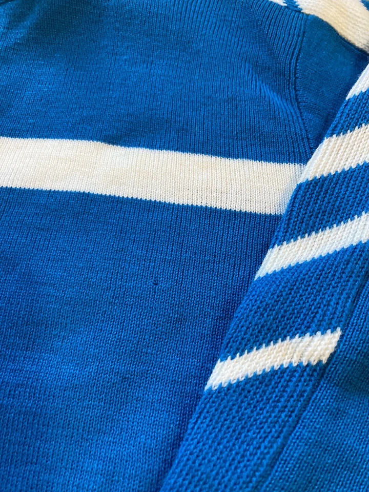 Suéter de esquí Obermeyer para niños Stinger talla 12, azul y blanco, ribete rojo. Foto 3 de 4