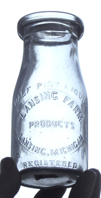 Lansing Farm Products Lansing, Mich. Mi. Embossed Half Pint Milk Bottle