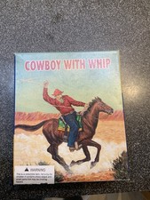 Vintage Schylling Cowboy with Whip Wind up Tin Toy
