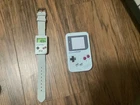 Nintendo gameboy watch with super Mario bros alarm and gameboy tin