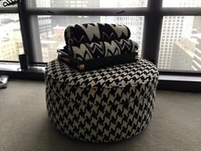 Black cream houndstooth chenille upholstered storage ottoman Carson Pirie Scot