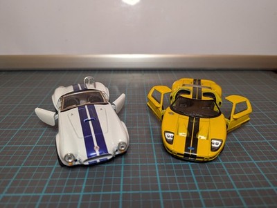 Kinsmart Lot Of 2 Diecast Pullback Action Ford 2006 Ford GT & 1965 Shelby Cobra 