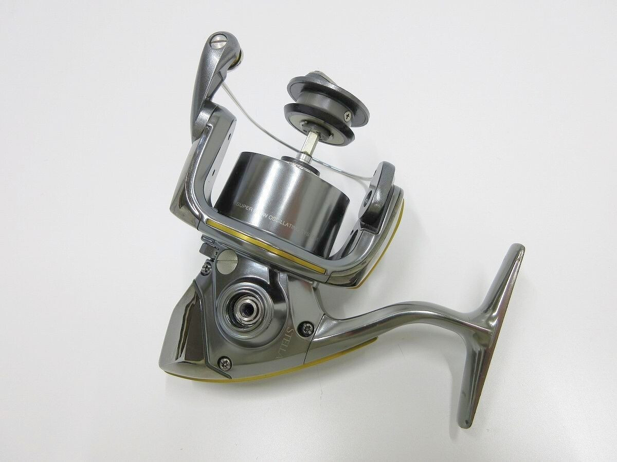 Shimano 04 Stella 3000 body Spinning Reel Fishing /AT4555/06 Shimano 04 Stella 3000 body Spinning Reel Fishing /AT4555/06