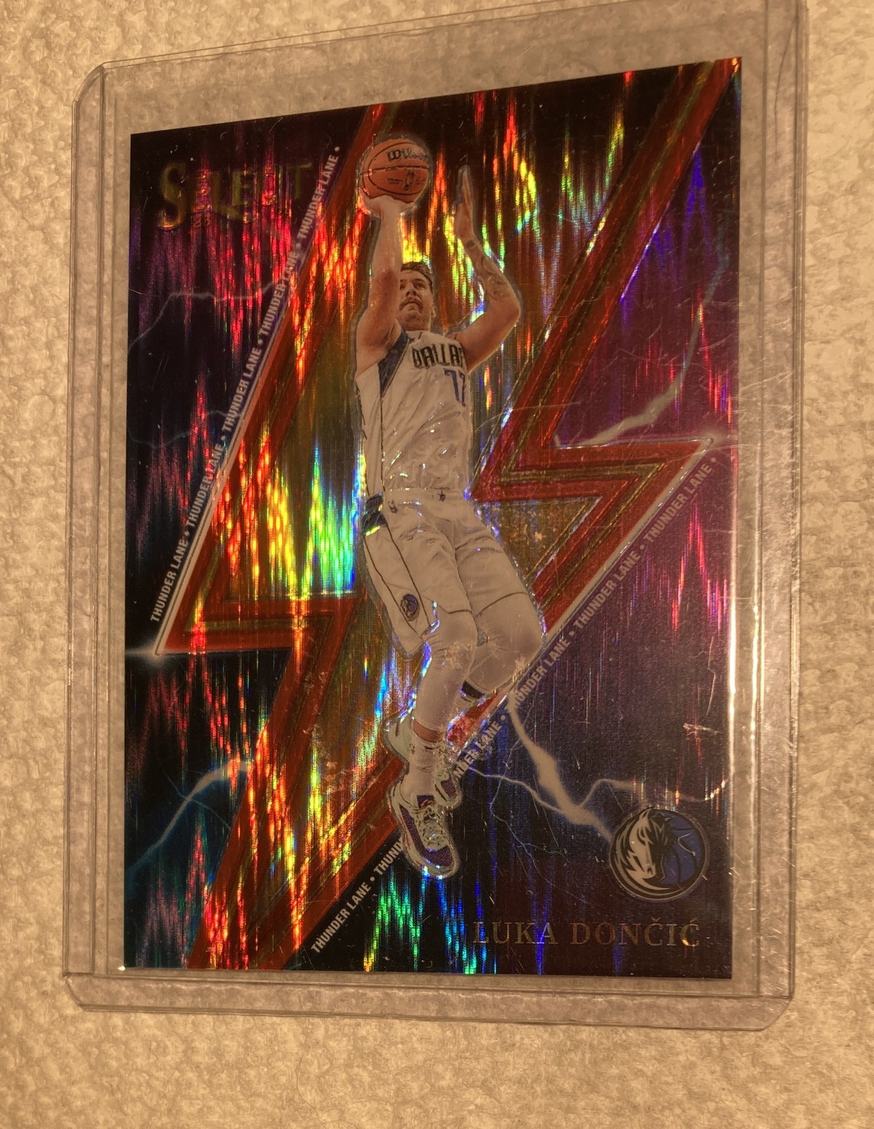 2023-24 Select Luca Doncic Red Flash Thunder Lane Prizm #3. 68/99