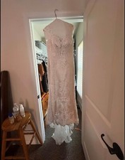 Beautiful Casablanca Wedding Dress, size 12. Built in PUSH UP bra 