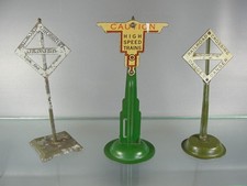 American Flyer, Marx, and unmarked crossing signs.