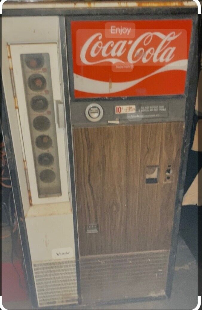Vintage early 1960's Vendo Coca-Cola vending machine model Vintage early 1960's Vendo Coca-Cola vending machine model