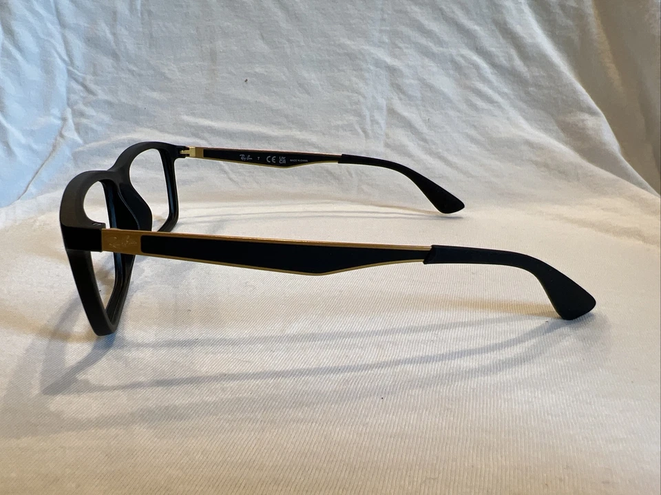 Monturas para gafas Ray Ban RB7056 5644 55[]17-145 negras y doradas Foto 2 de 4