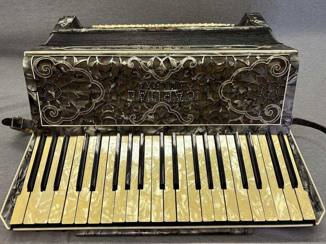 Ornate Vintage Capital DeLuxe Accordion