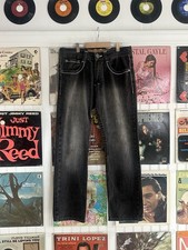 Southpole black jeans with white stitching on back pockets