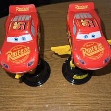 Disney Parks Cars Lightning McQueen Piston Cup Spinning 2 Trofeo de Luz y Sonido-