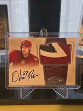 Oliver Ekman-Larsson 10-11 Panini Dominion Rookie Patch On Card Autograph 52/99. rookie card picture