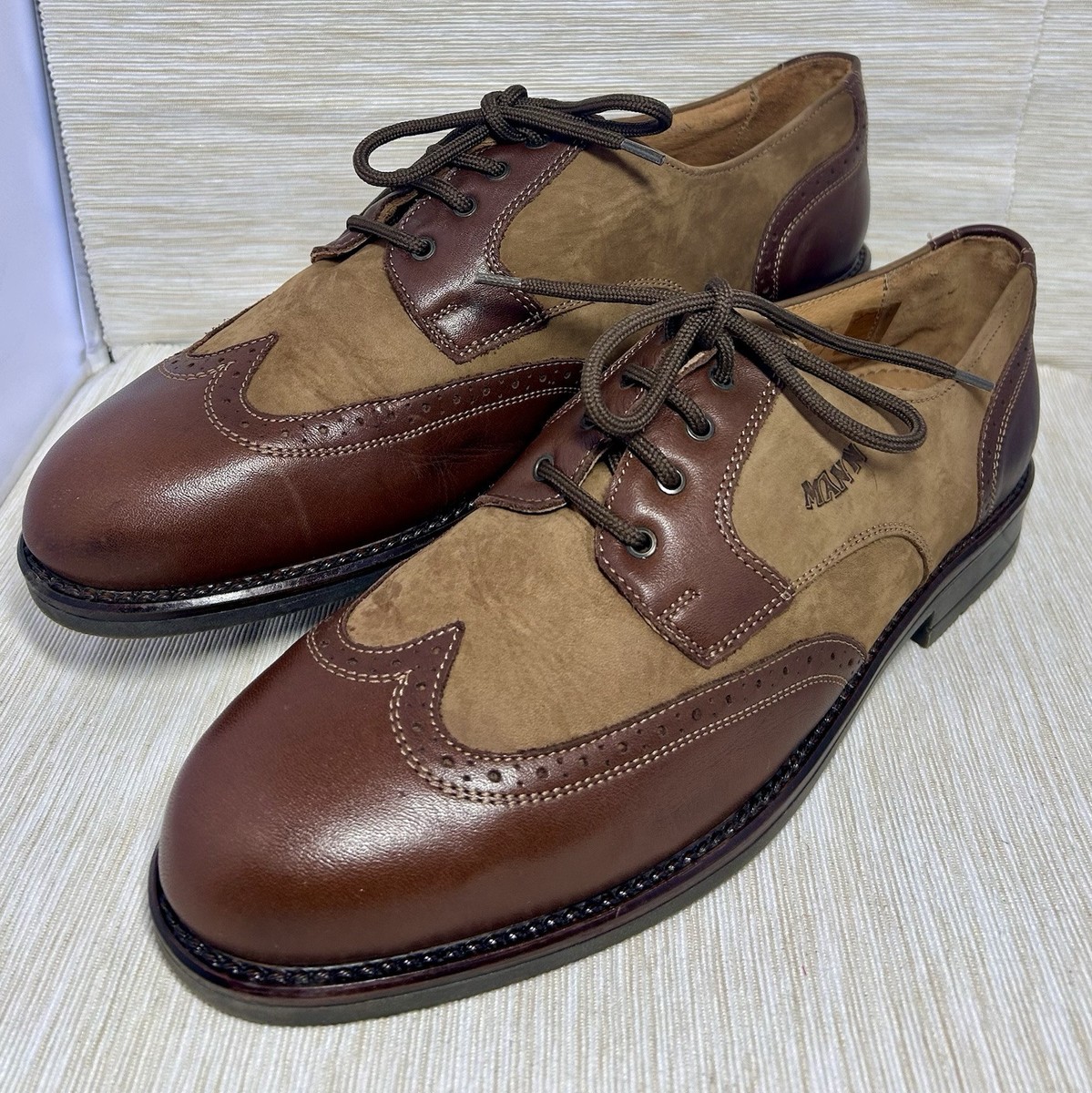 Scarpe Oxford in pelle nera e marrone