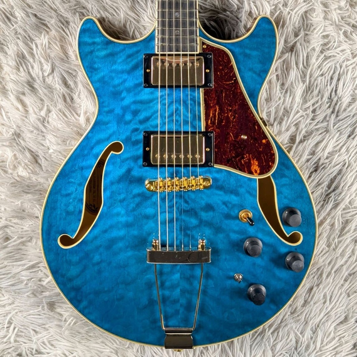 Ibanez AMH90QM TBL Translucent Blue electric guitar with gig bag