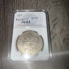 1904 Silver morgan dollar Slabbed