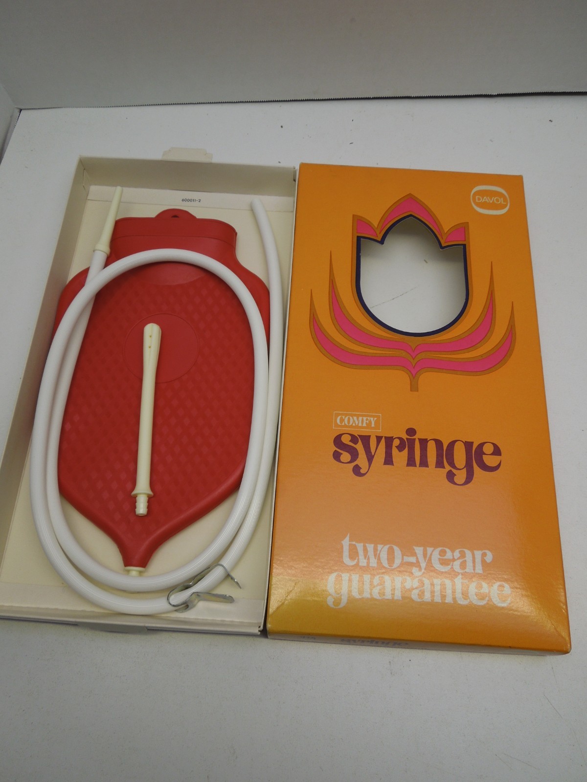 A PAIR of VINTAGE DAVOL COMFY WATER BOTTLE/SYRINGE COMBINATION #12