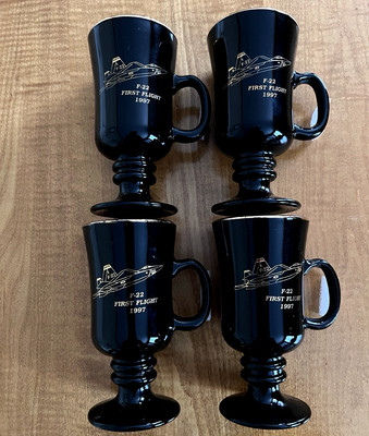 Set of 4: F-22 RAPTOR ''First Flight 1997'' Black/Gold Trim Stemmed Executive Mugs