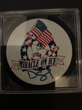 DAVE SILK  1980 OLYMPIC HOCKEY MIRACLE ON ICE AUTOGRAPHED PUCK “GRANDSTAND”
