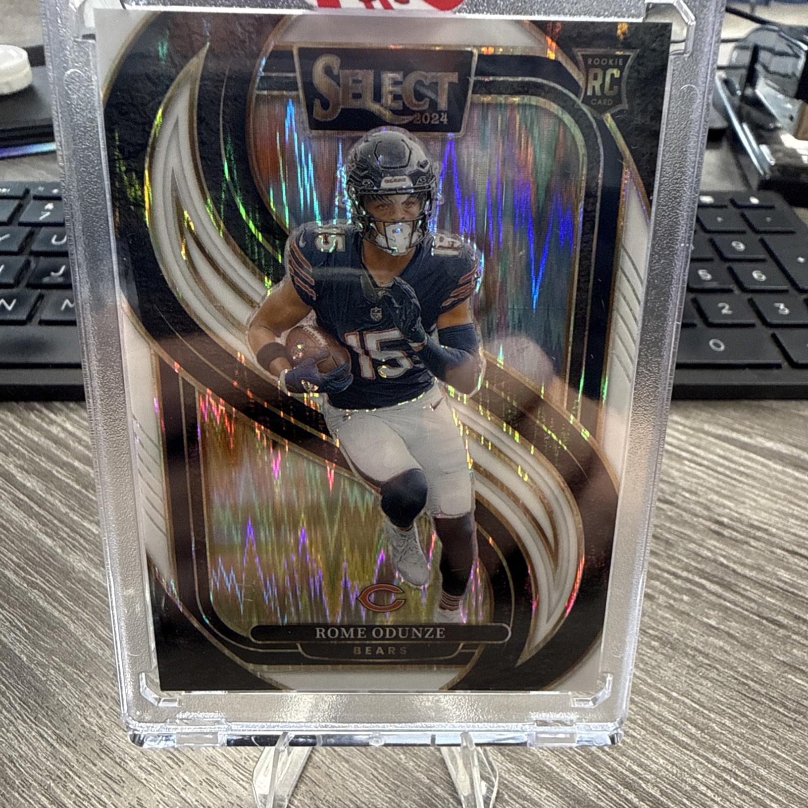 2024 Panini Select - Premier Level Rome Odunze #136 White Shock Prizm /199 (RC)