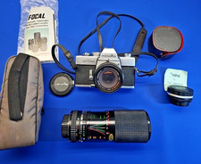 Minolta SRT-201 35mm Camera bundle with 2 lenses, and 2 tele converters. vintage