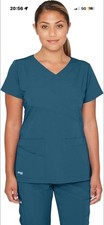 Size small  GREYS ANANTOMY SIGNATURE WOMEN MOCK WRAP SCRUB TOP IN BAHAMA 2130