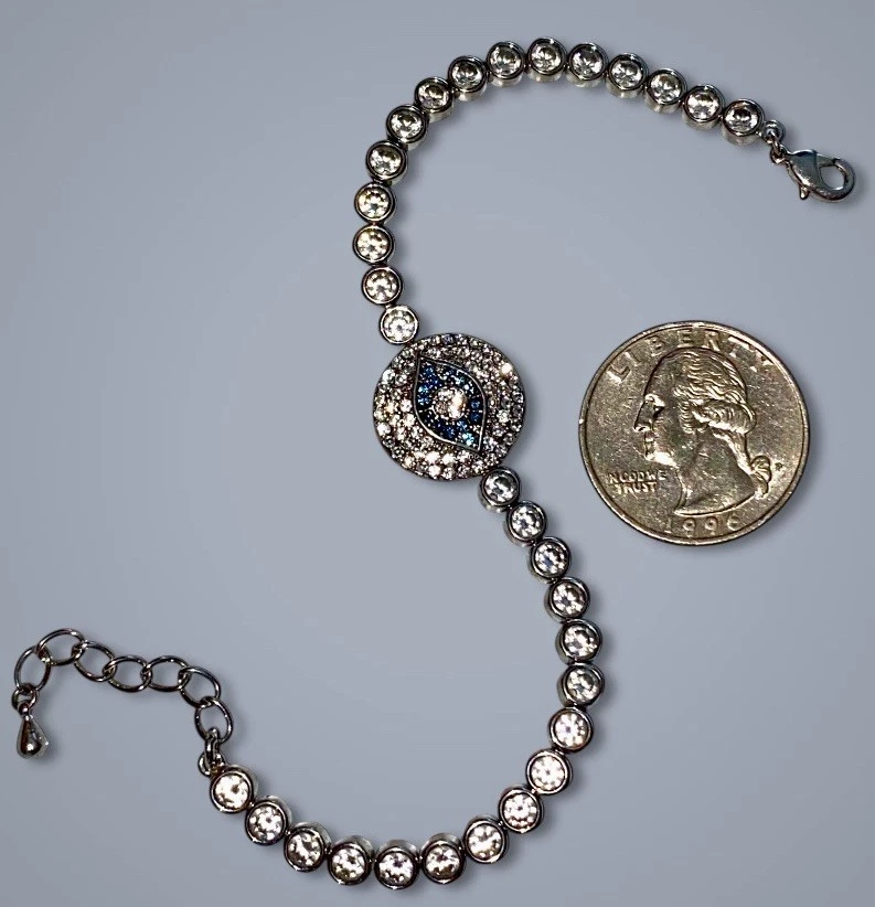 "Brazalete Joan Boyce Cristal Transparente y Azul 'Ángel' Mal de Ojo Tono Plata Bisel 7-8""" Foto 3 de 4