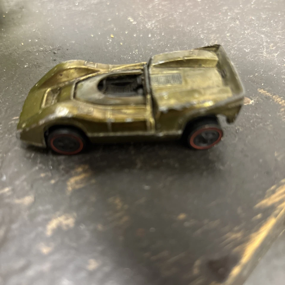 Hot Wheels 1968 Redline Mclaren M6A dorado Foto 2 de 4