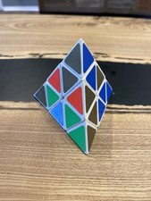 Rompecabezas combinado vintage Pyraminx de TOMY Pyramid Triangle Rubik’s Cube años 80’s