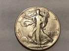 1938 -P- Walking Liberty half dollar in (F to VF) condition- cleaned.