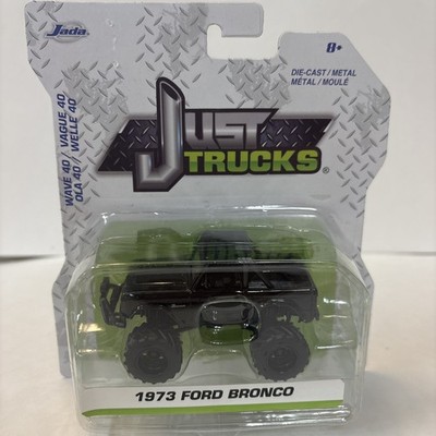 1/64  Jada Toys Just Trucks Black 1973 Ford Bronco Lifted 4X4 Half Top Wave 40