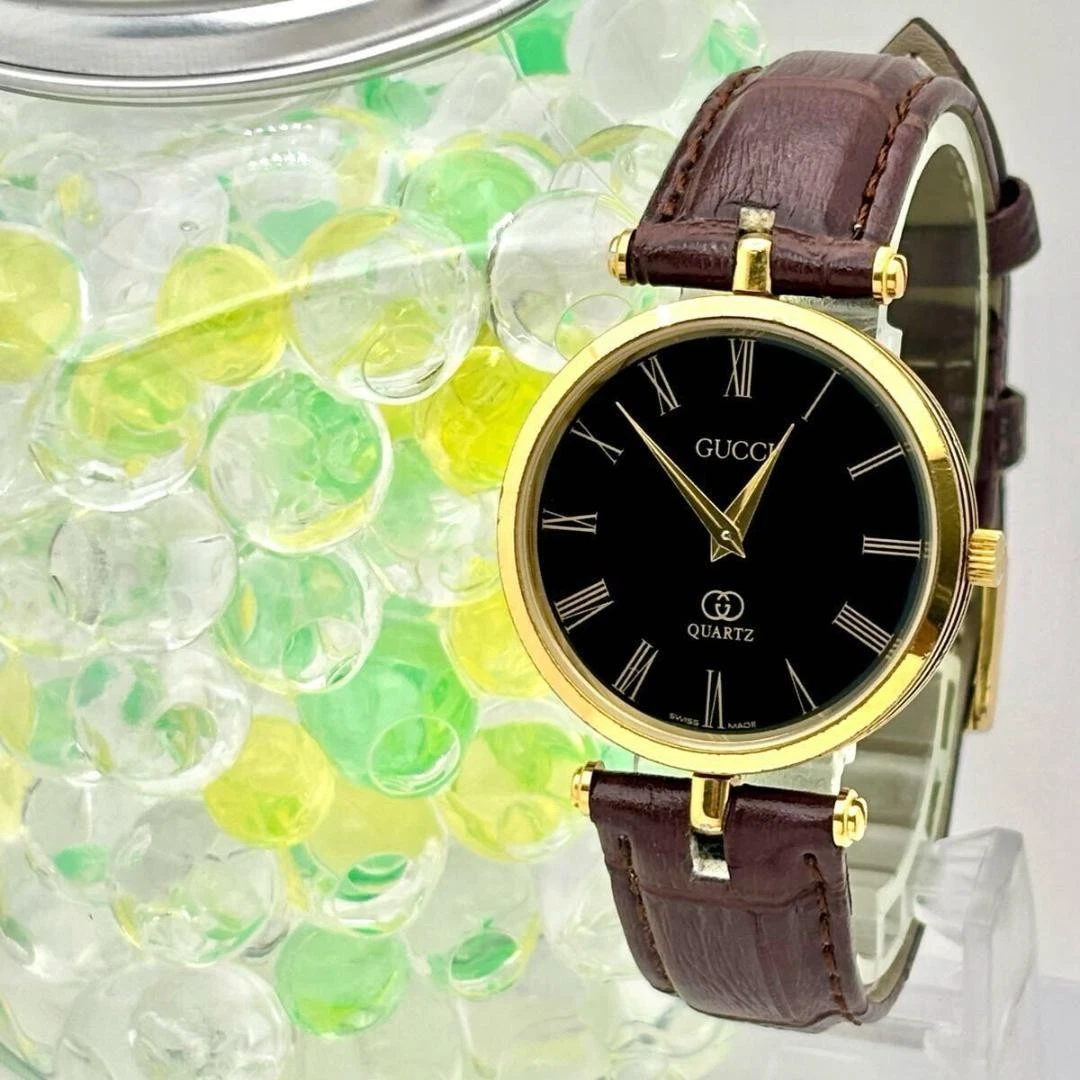 Montre homme Gucci ceinture pare brise dorée