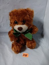 First Main brown plush teddy bear with a green ribbon bow tie. 5 Inch