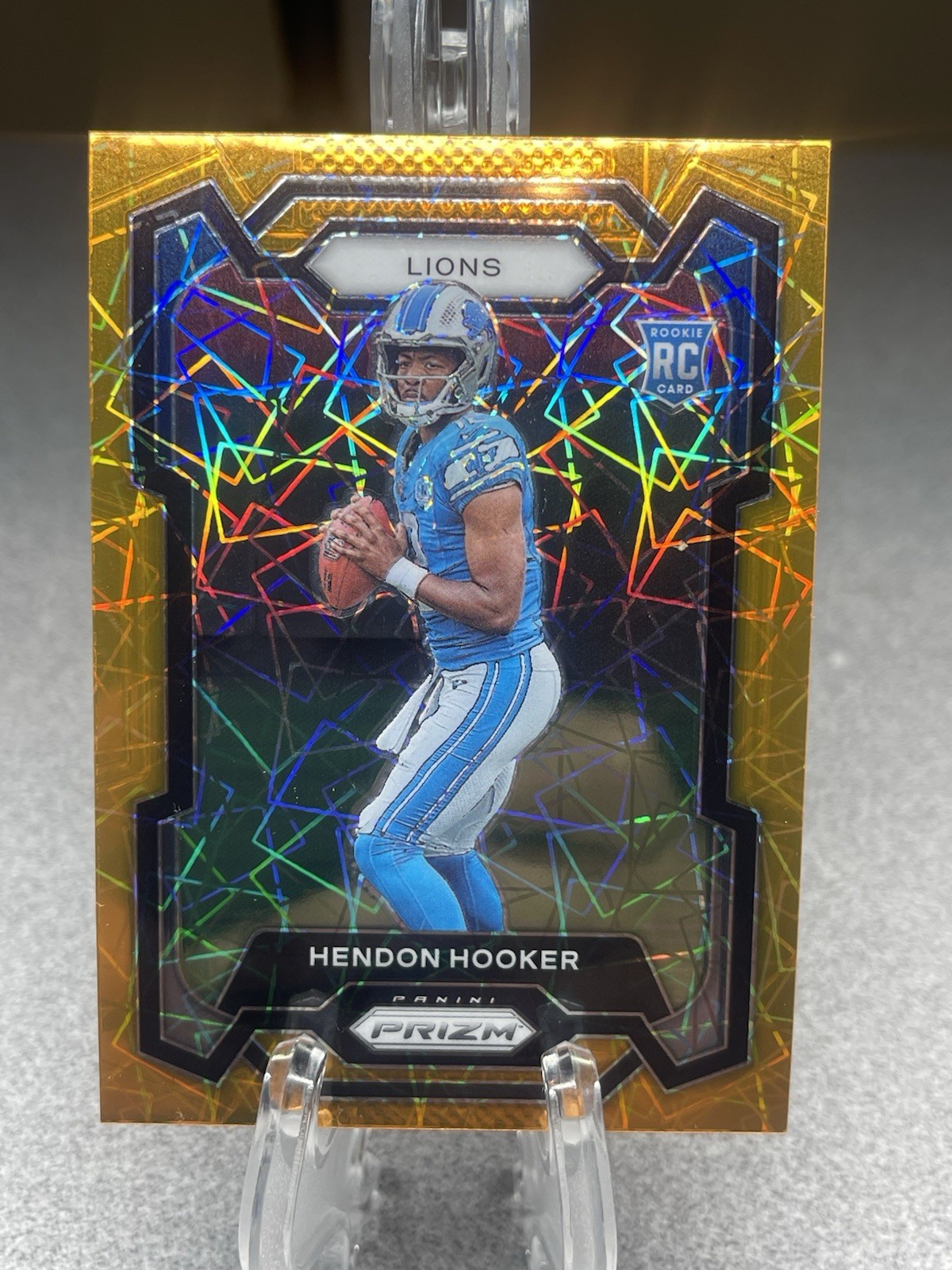 2023 Panini Prizm Hendon Hooker Rookie Orange Lazer Prizm RC #329 Lions