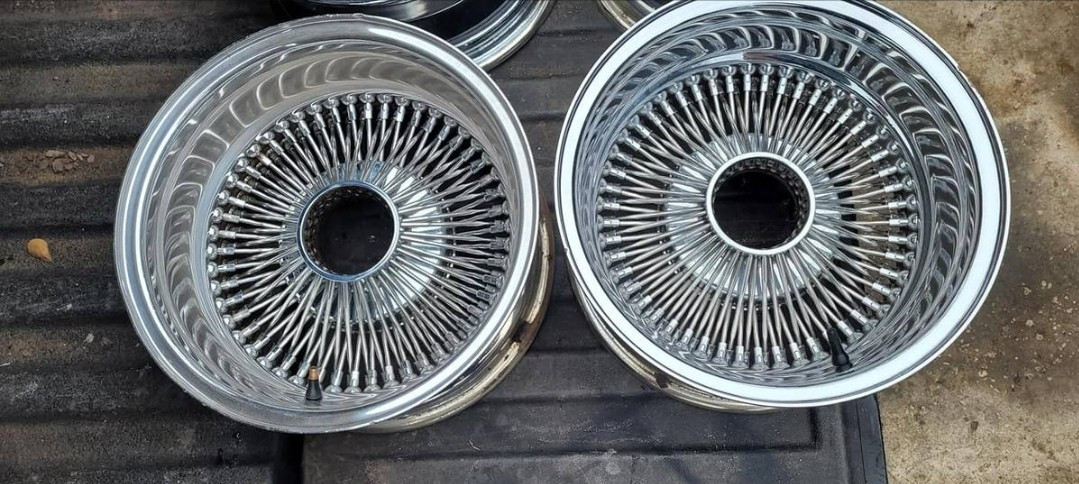 2) 14 by 7 reverse 100 spoke all chrome rims authentic