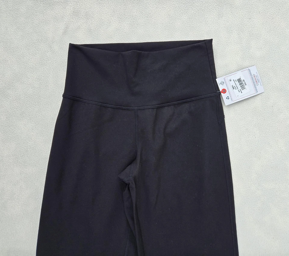 Брюки Champion женские маленькие черные мягкие на ощупь экологичные расклешенные с высоким подъемом для йоги - Изображение 2 из 4