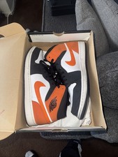 Air Jordan 1 Mid 'Laser Orange' Black Sneakers