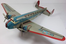 MARX SKYCRUISER NC 10 METAL FRICTION OPERATED AIRPLANE W/ SPINNING PROPELLERS.