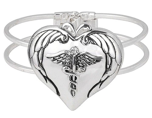 Pink Cuff Bracelet Watch with Silver Tone Accents and Unique  display picture 1
