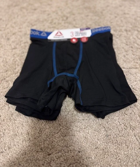 Calzoncillos boxer Reebok Performance para niños talla mediana 8/10 Foto 2 de 4
