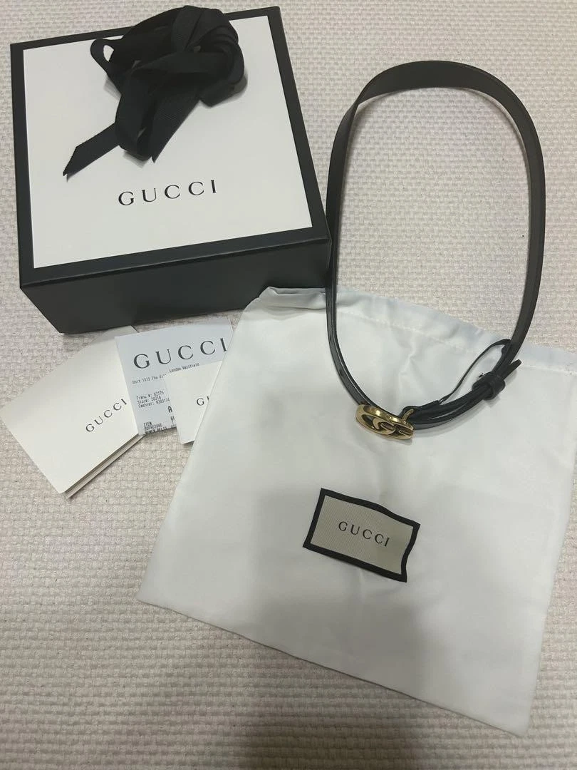 Ceinture GUCCI en cuir noir double boucle