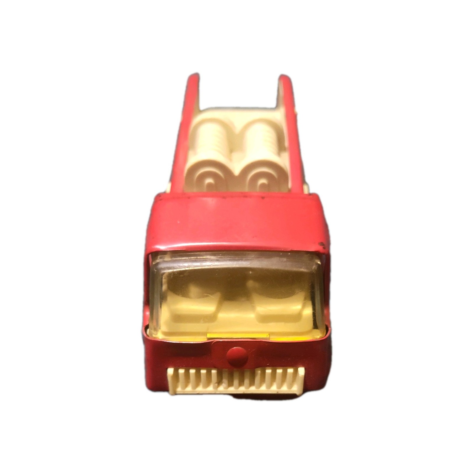 Red vintage 1970s Tonka No. 6 fire engine with yellow seats, black roof, and coiled hose detail.
