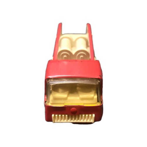 Red vintage 1970s Tonka No. 6 fire engine with yellow seats, black roof, and coiled hose detail.