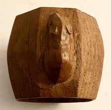 A ROBERT MOUSEMAN THOMPSON HAND CARVED OAK NAPKIN RING WITH SIGNATURE MOUSE