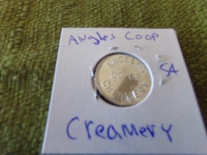 OLD TOKEN ANGLES  CO-OP CREAMERY GOOD FOR 5 CENTS UPON RETURN OF BOTTLE