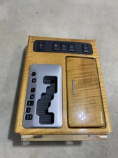 08-10 Infiniti QX56 Center Console Cup Holder Shift Bezel w/ Switches OEM Wood