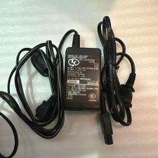 SONY AC-LM5 genuine AC adapter, 4.2V 1.5A, tested and working.
